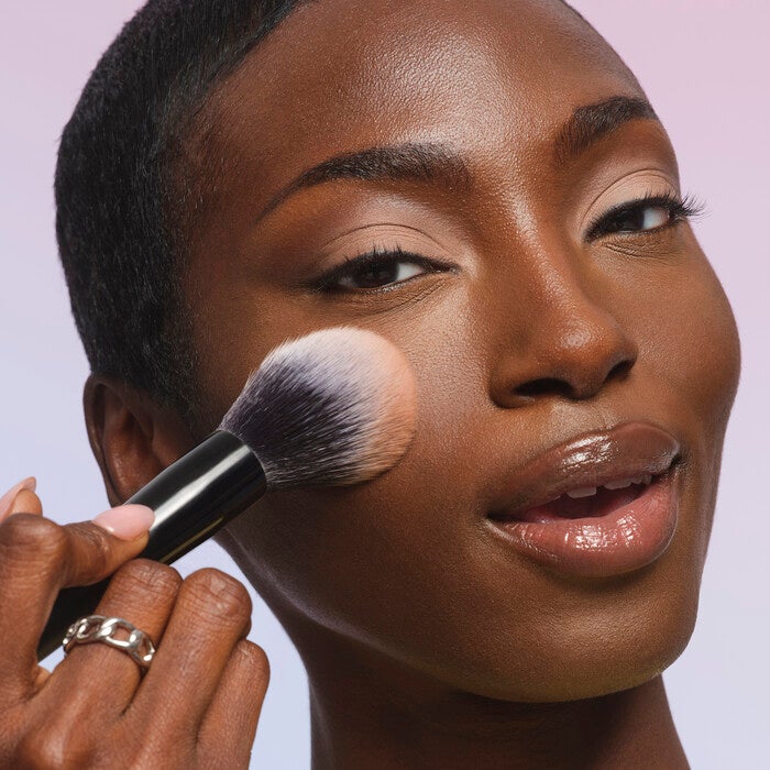 Apply Set it Bright Powder with Pointed Powder Brush